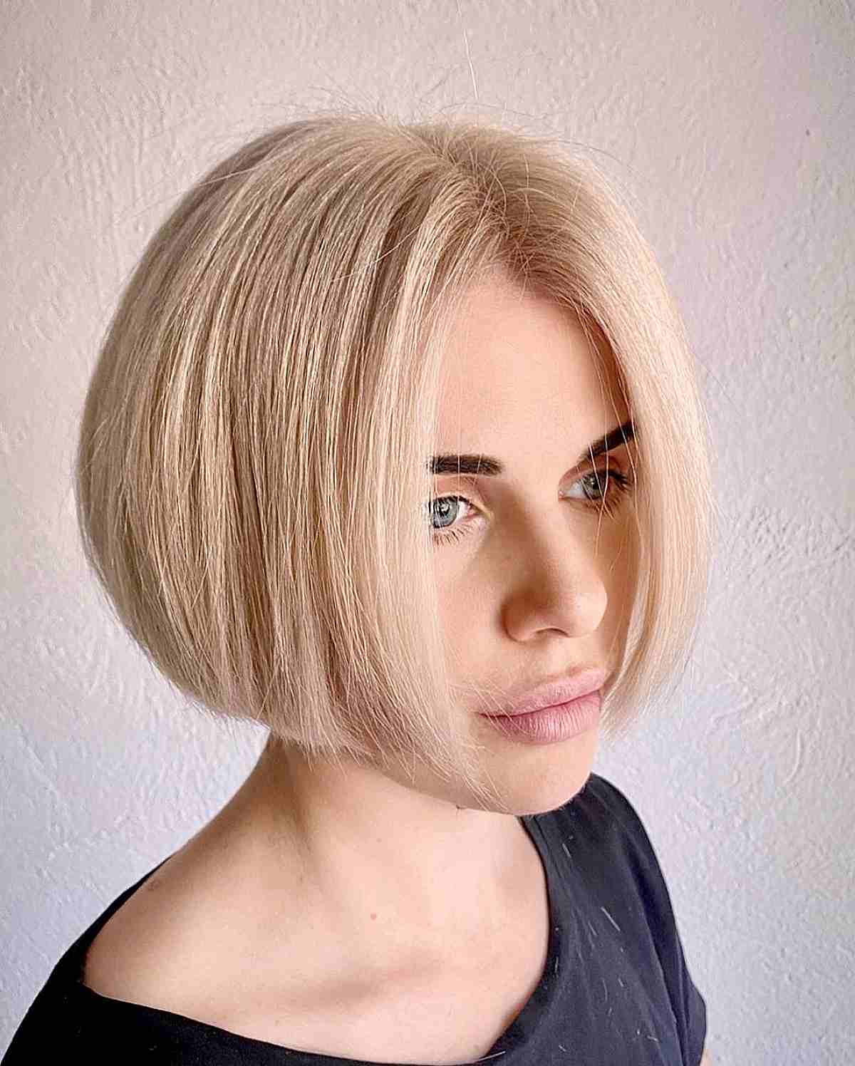 Complete Blonde Transformation on a Blunt Bob with a Middle Part