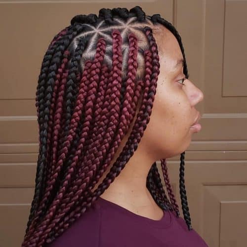 Medium length box braids featuring triangle sections