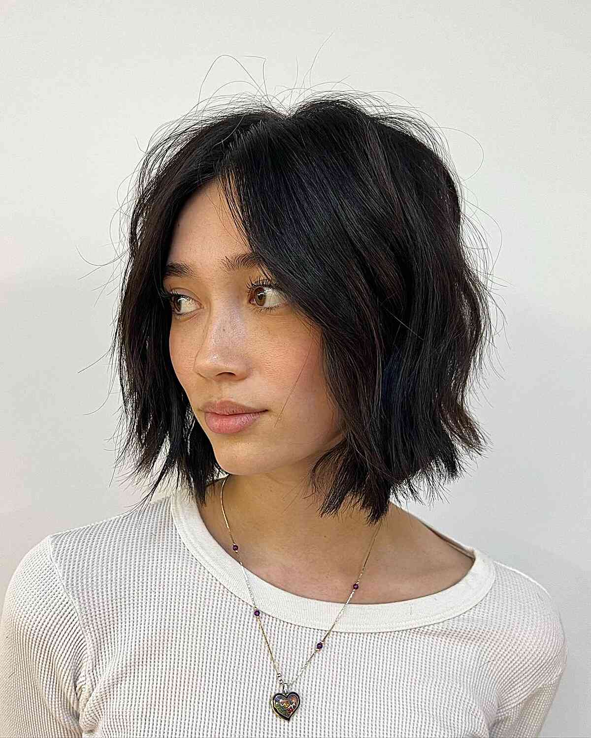 Short Contemporary Choppy Center-Parted Bob