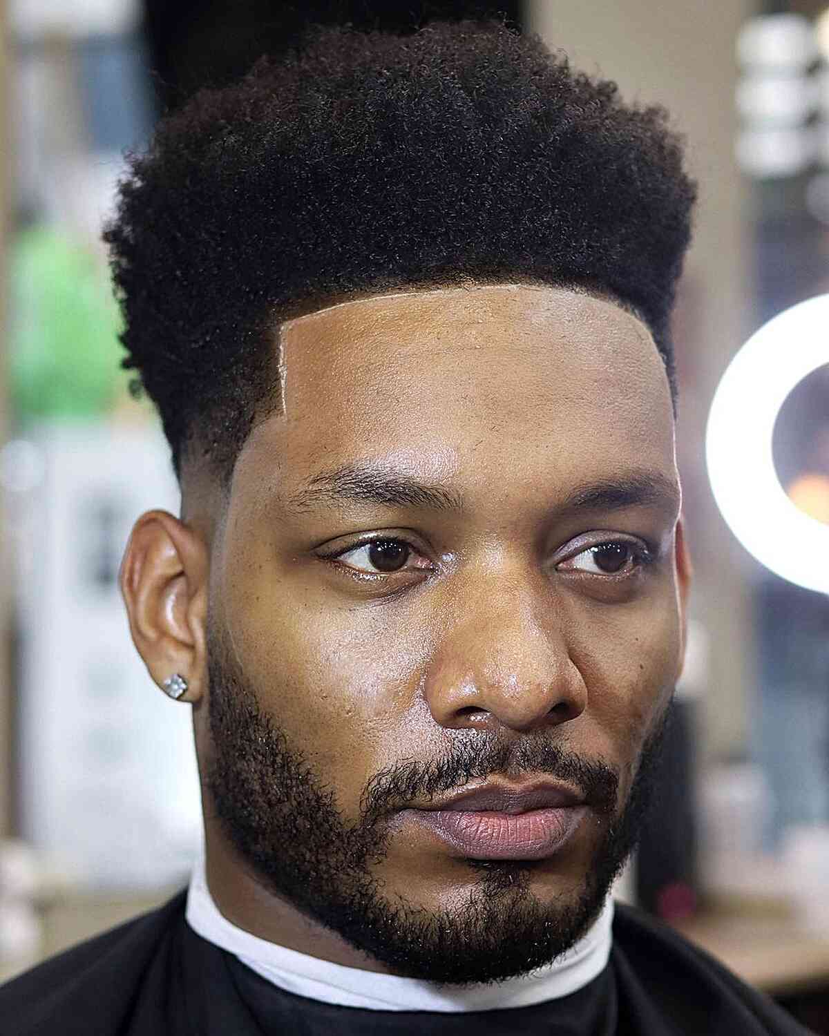 A sleek freehand fade haircut for black men