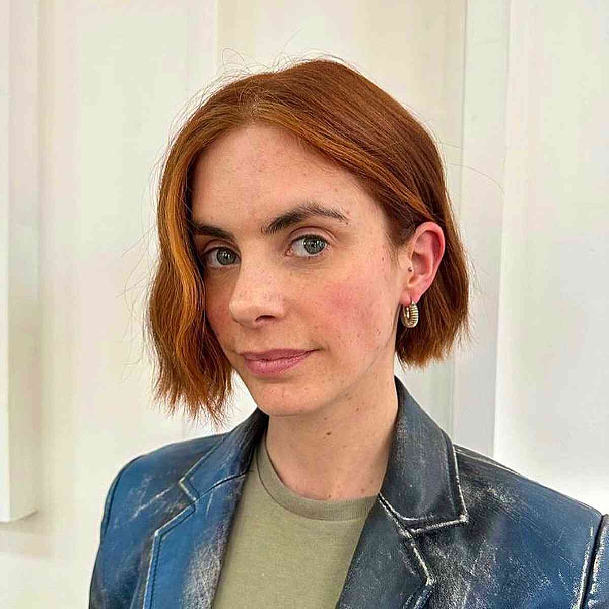 Chin-Grazing Copper Bob with Styled Textured Ends for Finer Hair