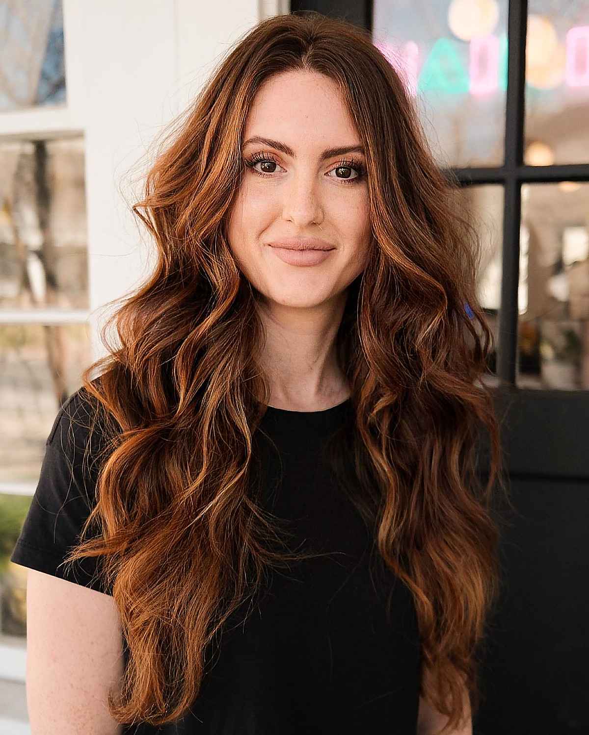 cozy warm brown balayage for long wavy locks