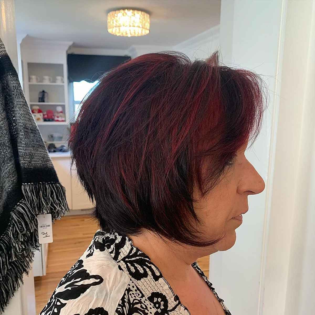 Crimson highlights on dark tresses