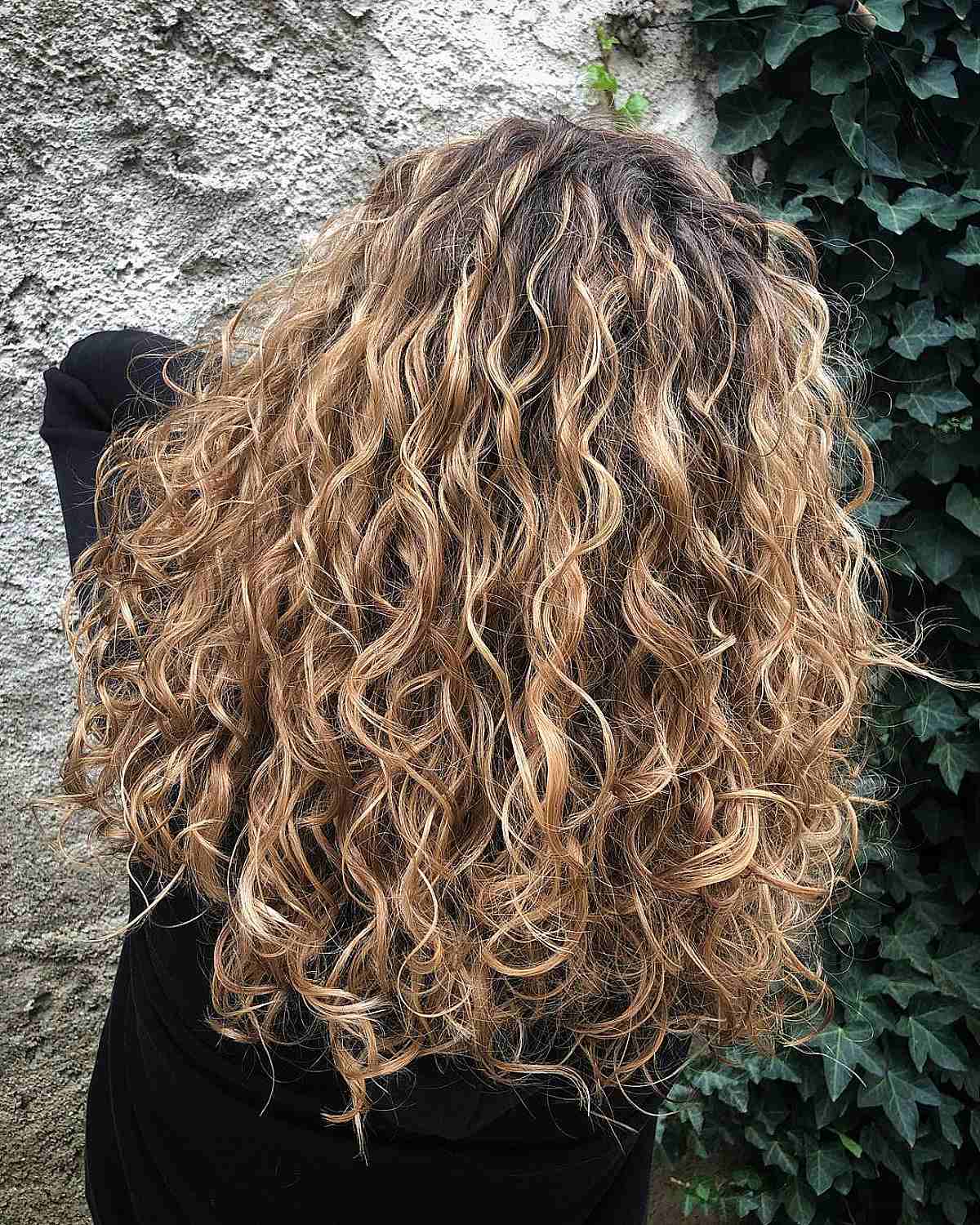 Curly Reddish-Beige Blonde Balayage