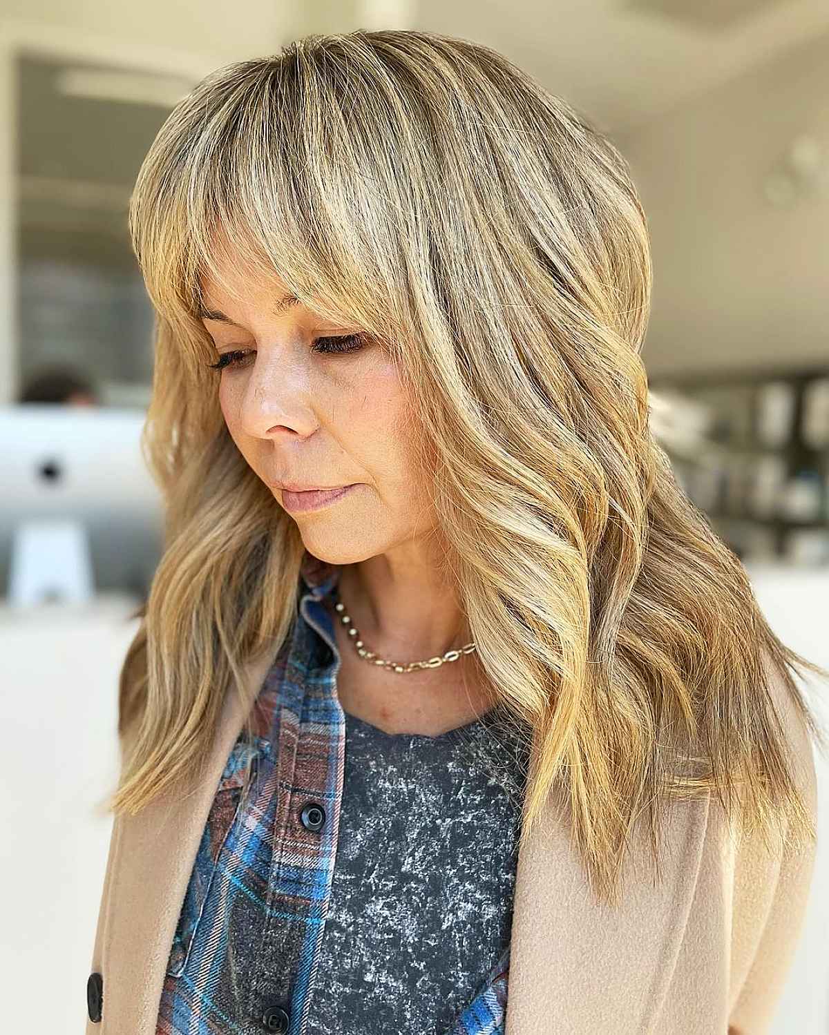 Curtain Bangs with Mid-Length Wavy Locks