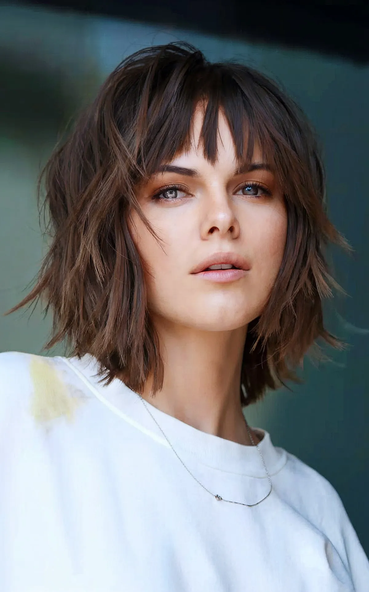 Deep chocolate short shaggy hair