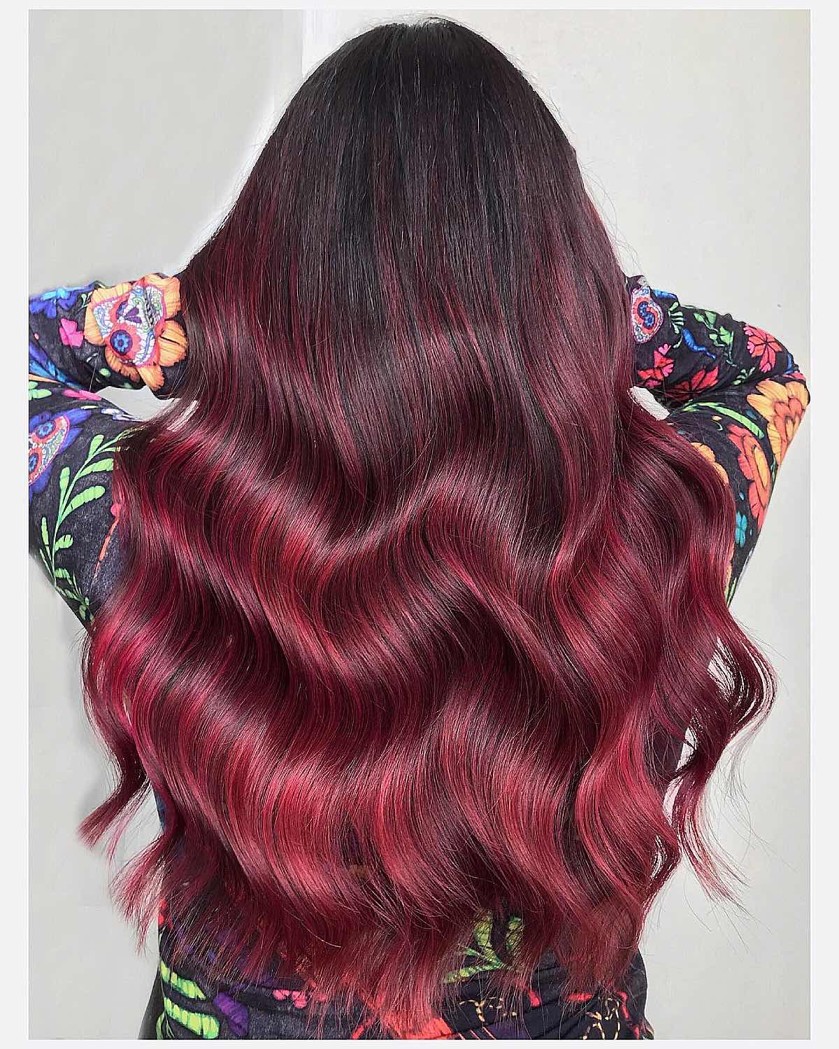 deep magenta balayage on dark hair