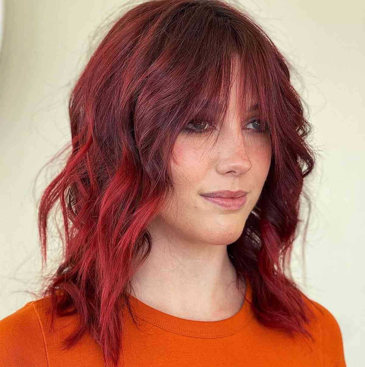 Deep Red Shaggy Cut with Sheer Wispy Fringe