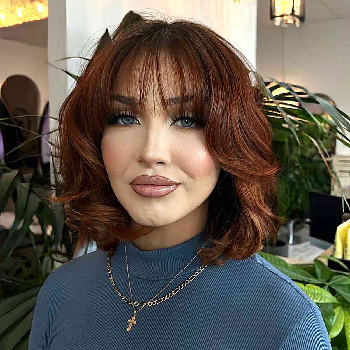 Deep Scarlet Bob with Soft Fringe for ladies with shoulder-length straight hair