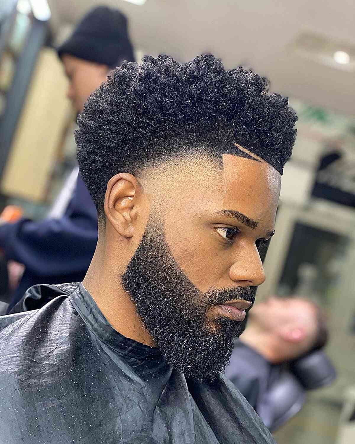 Defined Afro with a Beard Fade for Black Guys