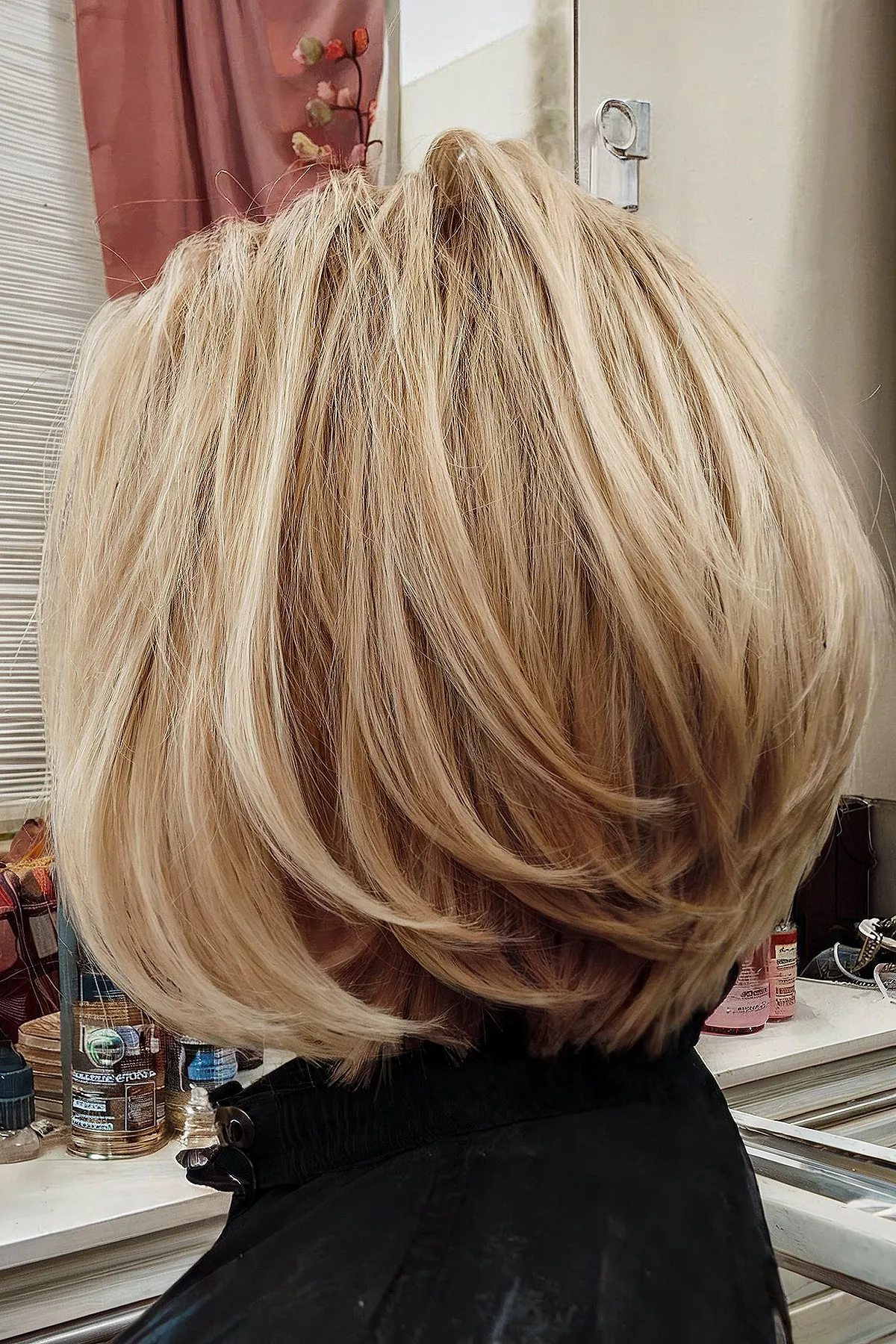 Delicate Blonde Layers on a Stacked Bob