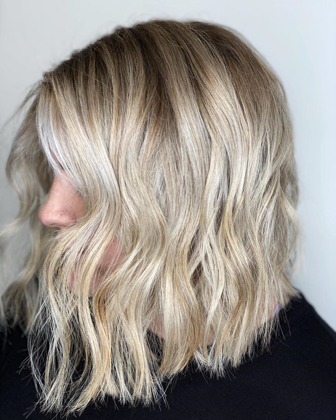 Delicate Creamy Blonde on Collarbone-Length Long Bob