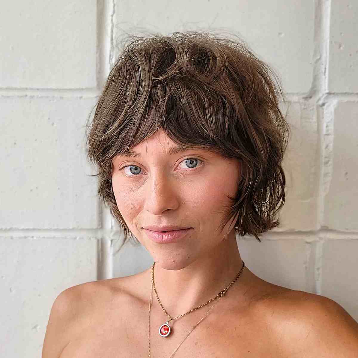 Delicate Disheveled Bob with Curtain Bangs