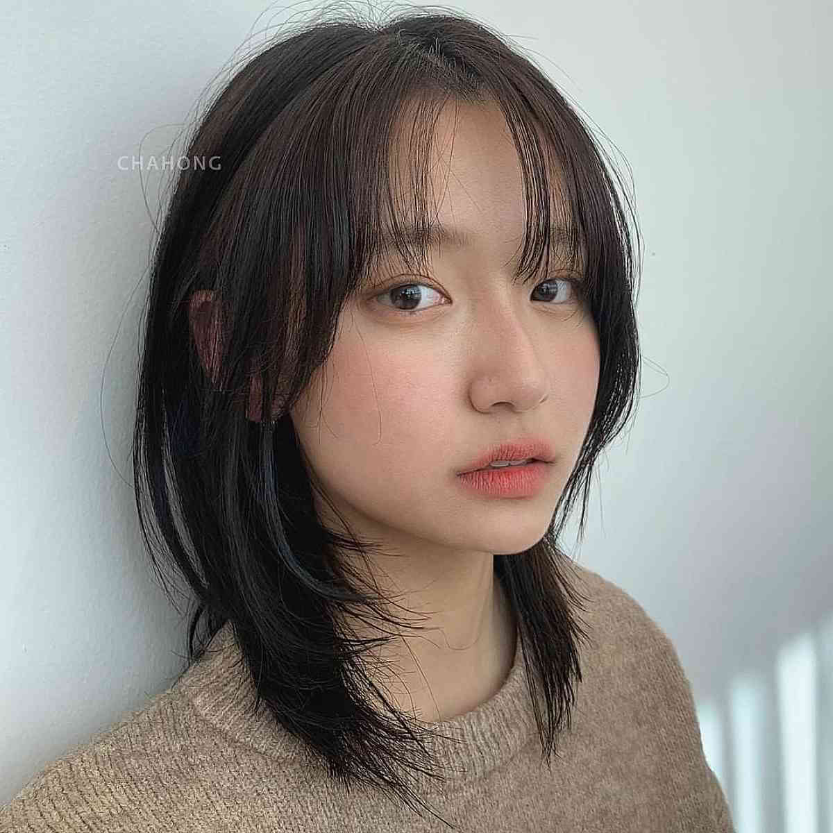Delicate Layered Style on Collarbone-Length Hair