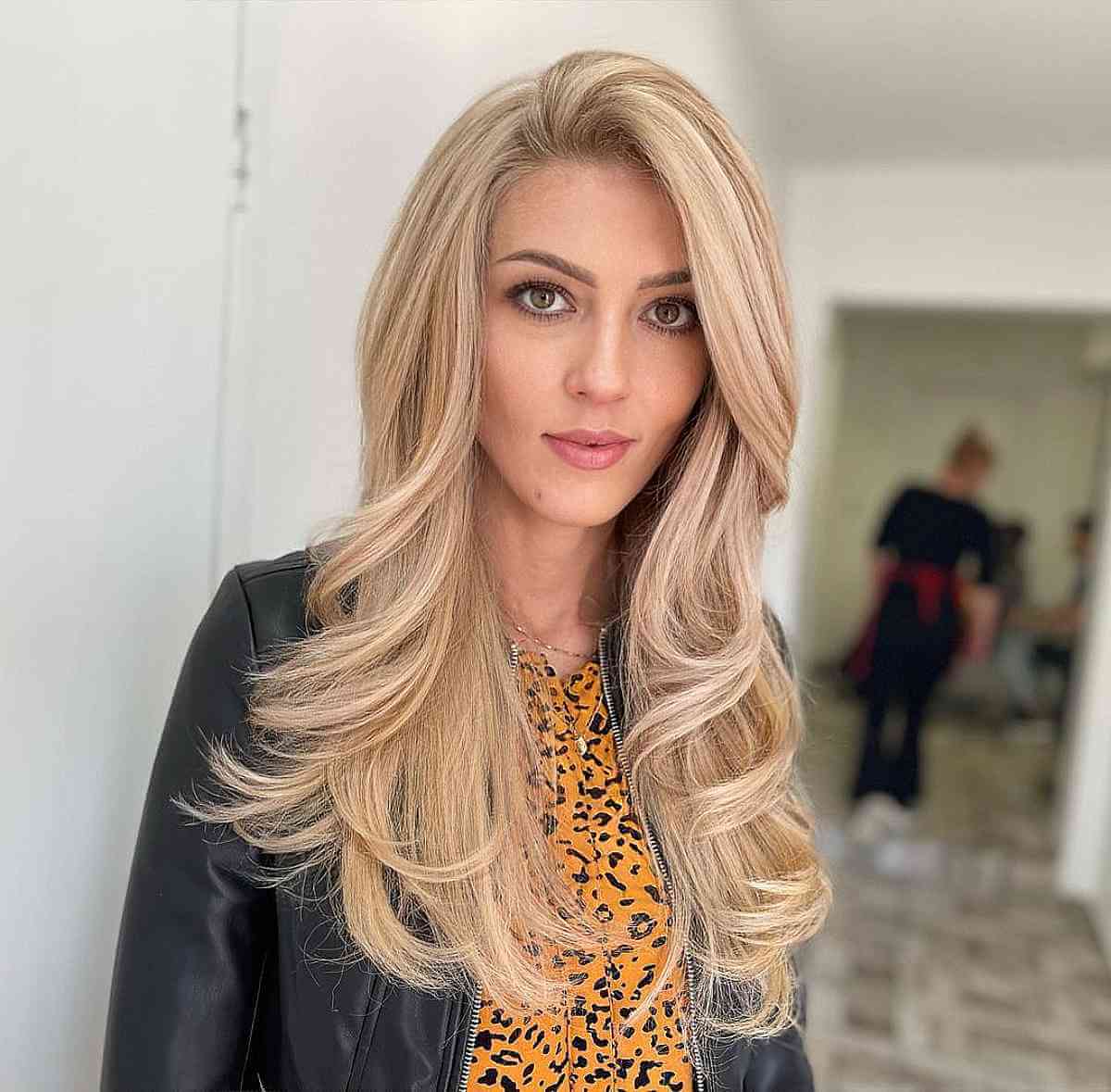 Delicate Layers on Extended Blonde Locks