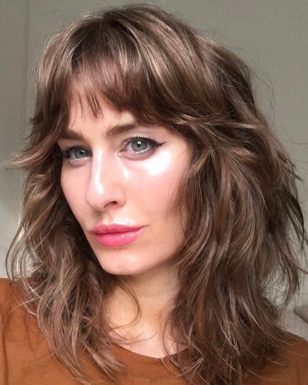 Disheveled choppy layers for fine mid-length hair