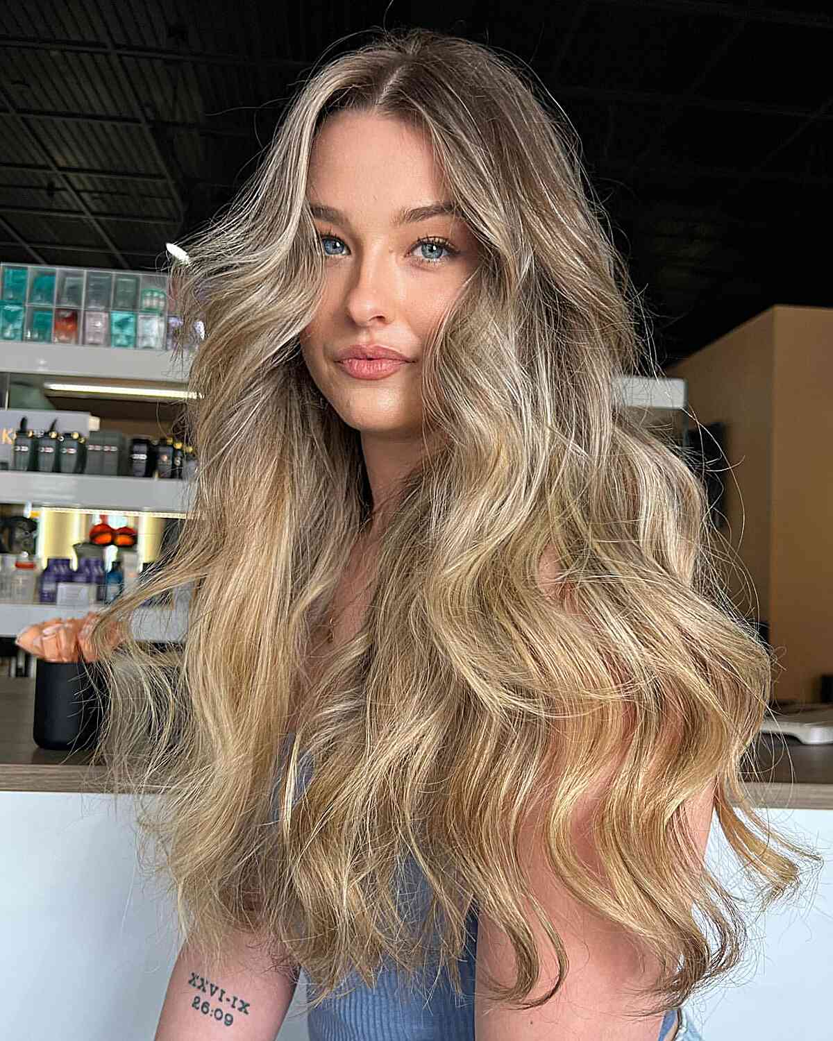 Long-Length Dishwater Blonde Hair with Root Fade