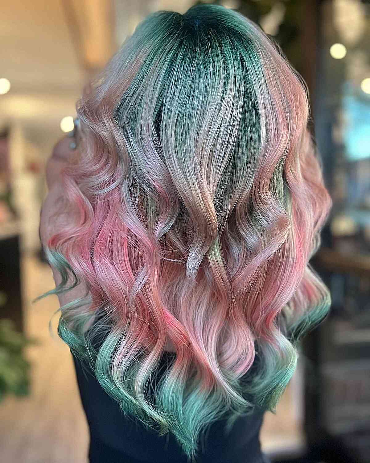 Dramatic Pinks and Aquamarine Greens with Dark Roots Hair Color Inspiration