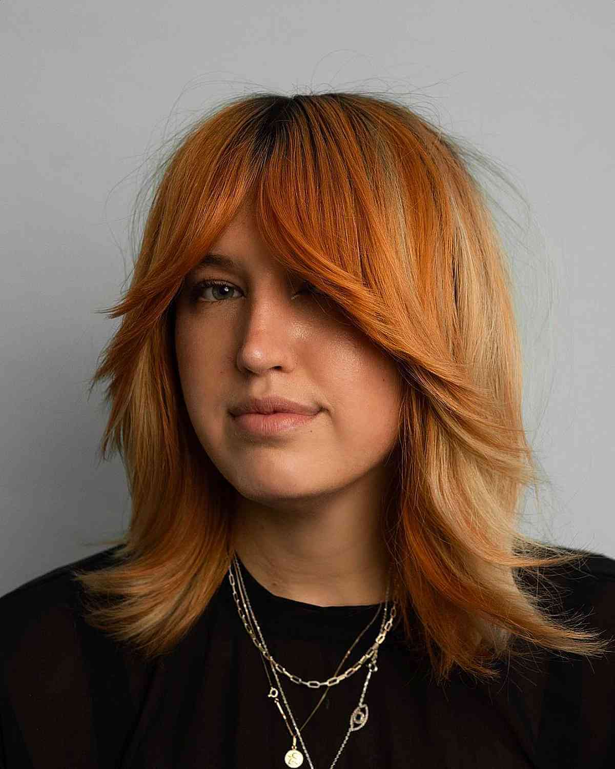 Dynamic Copper Blonde Bottleneck Fringe and Cut