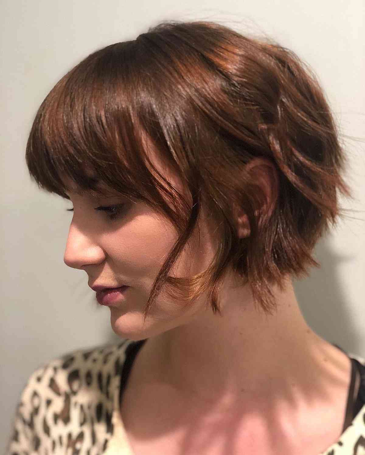 Jaw-Length Edgy Inverted Choppy Bob with Bangs