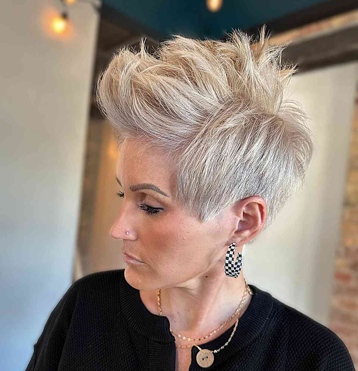 Edgy Platinum Pixie with a Lengthy Spiky Top