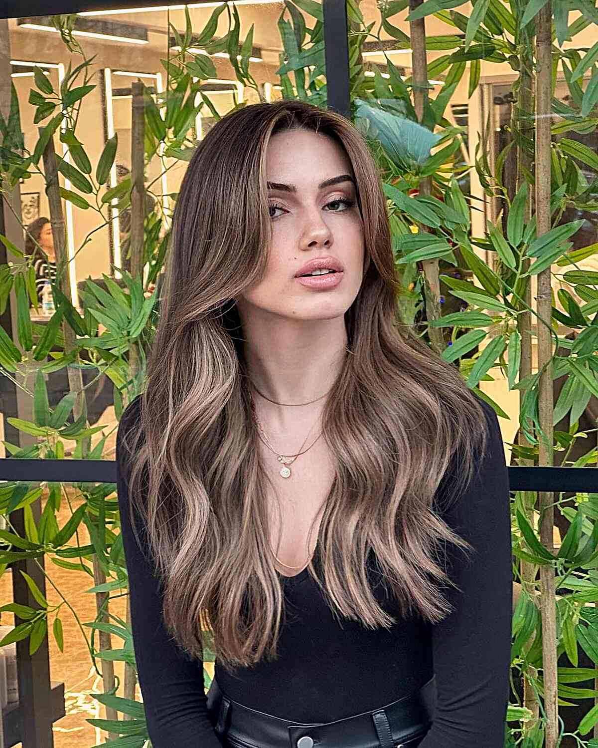 Effortless Natural Brunette Balayage with a Gentle Face Frame for Long-Length Layers