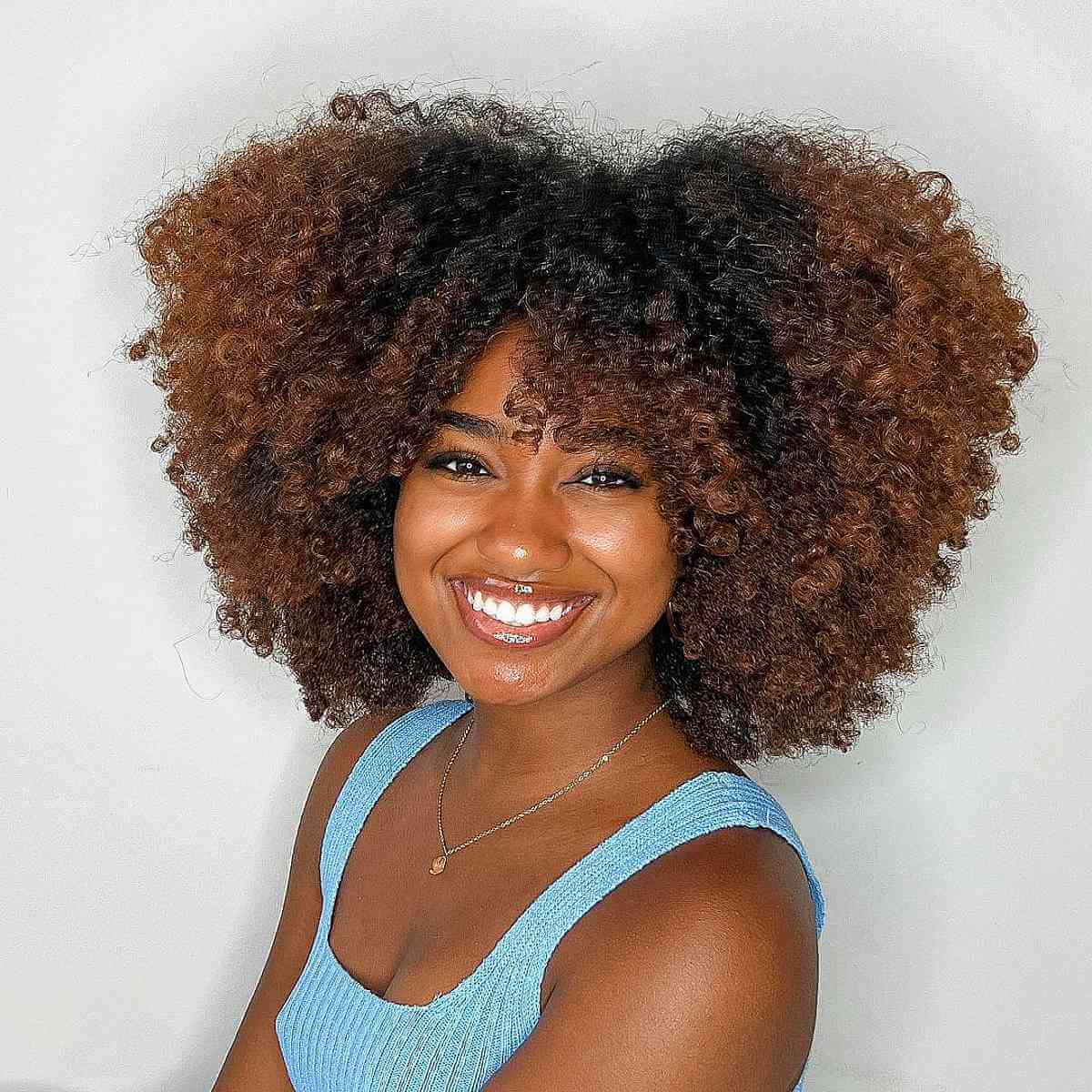 Effortless Kinky Black Hair with Bangs