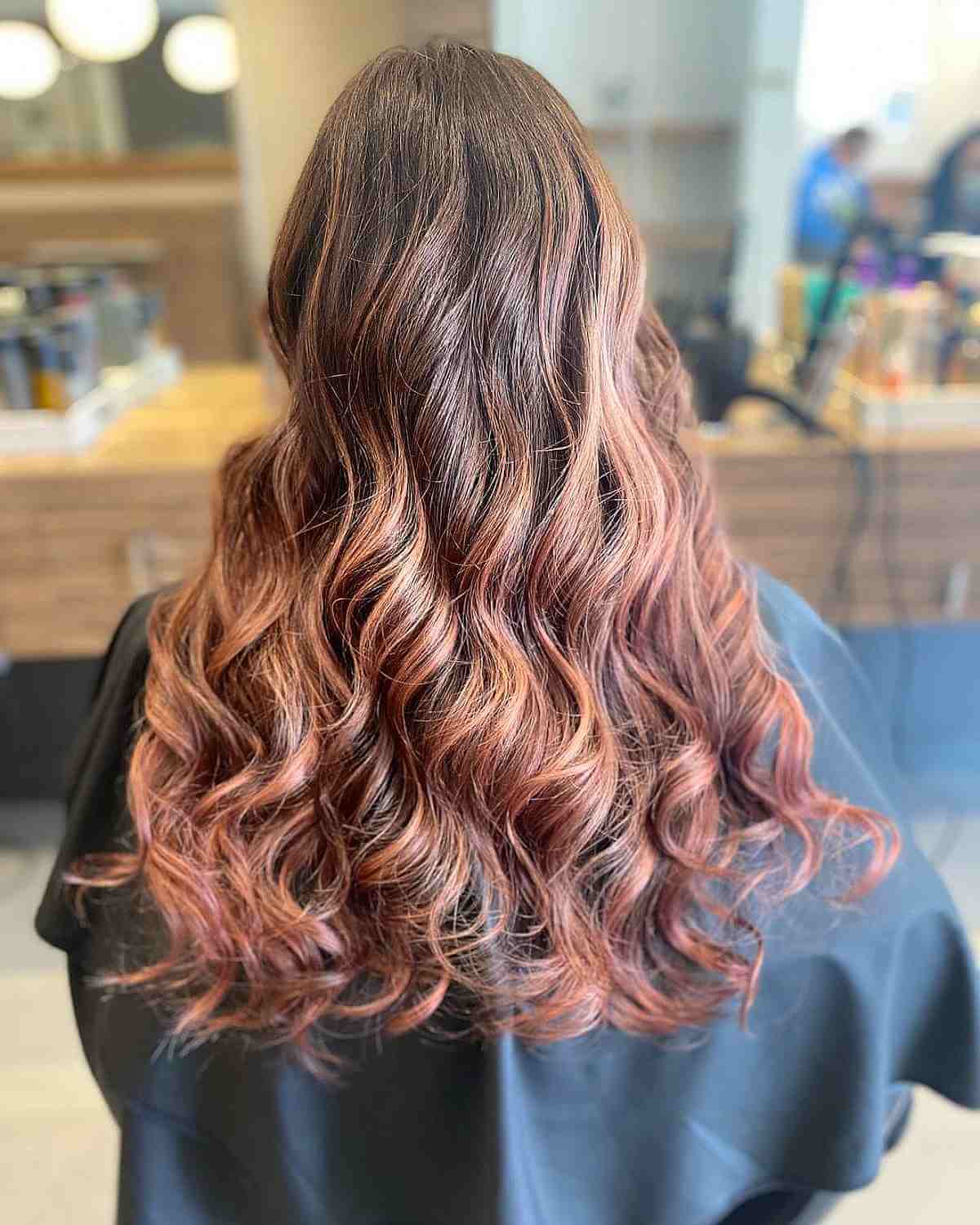 Effortless Rose Gold Balayage on Dark Tresses