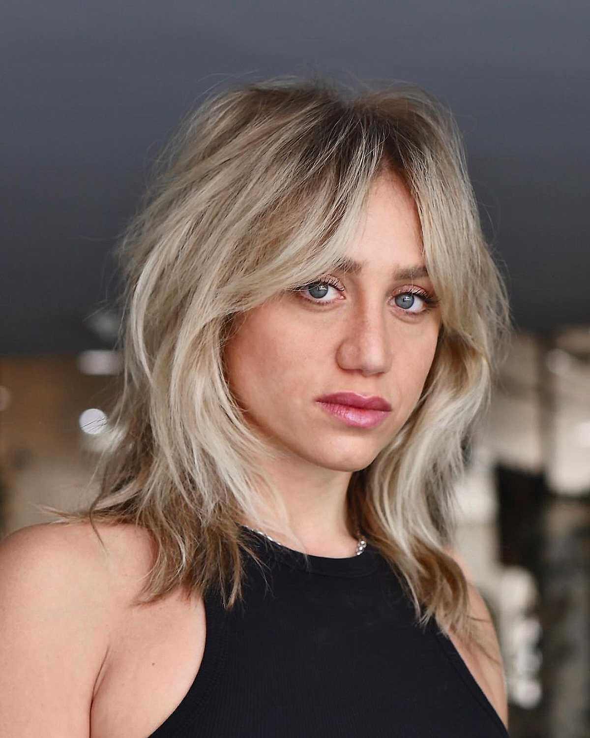 Effortless Shag for Medium-Length, Straight Hair with Curtain Bangs