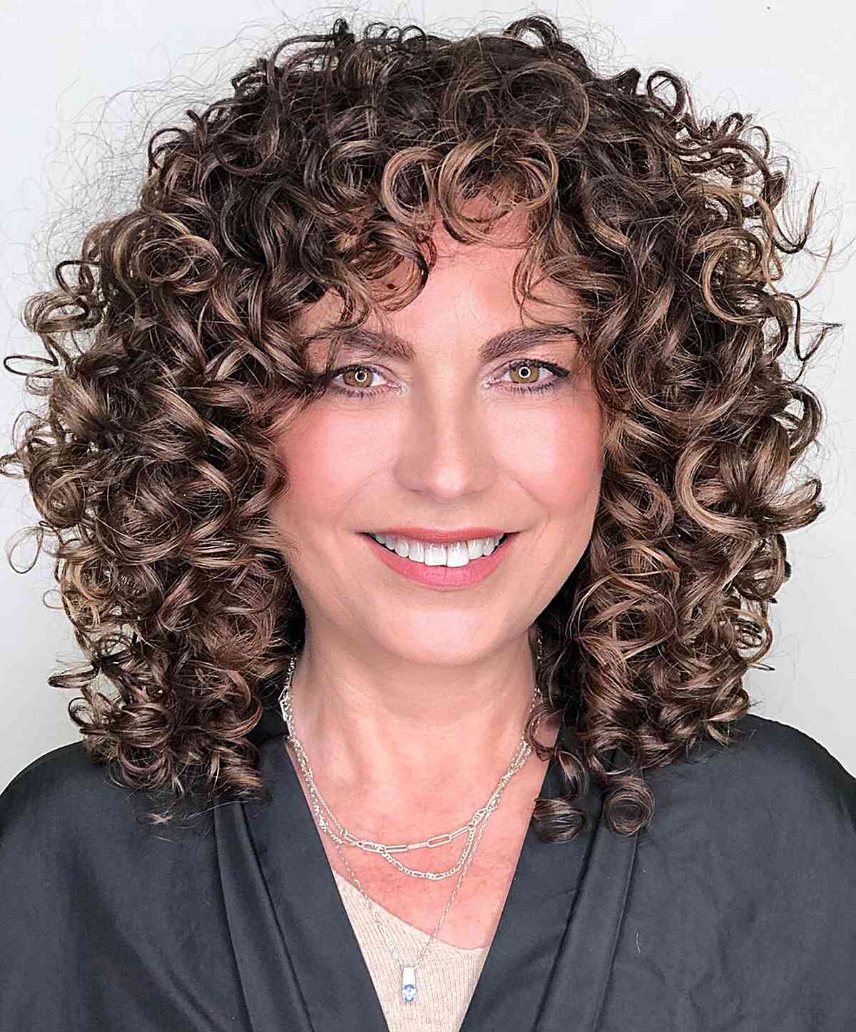 Effortless Soft Curls for Women Aged 50 with Mid-Length Hair
