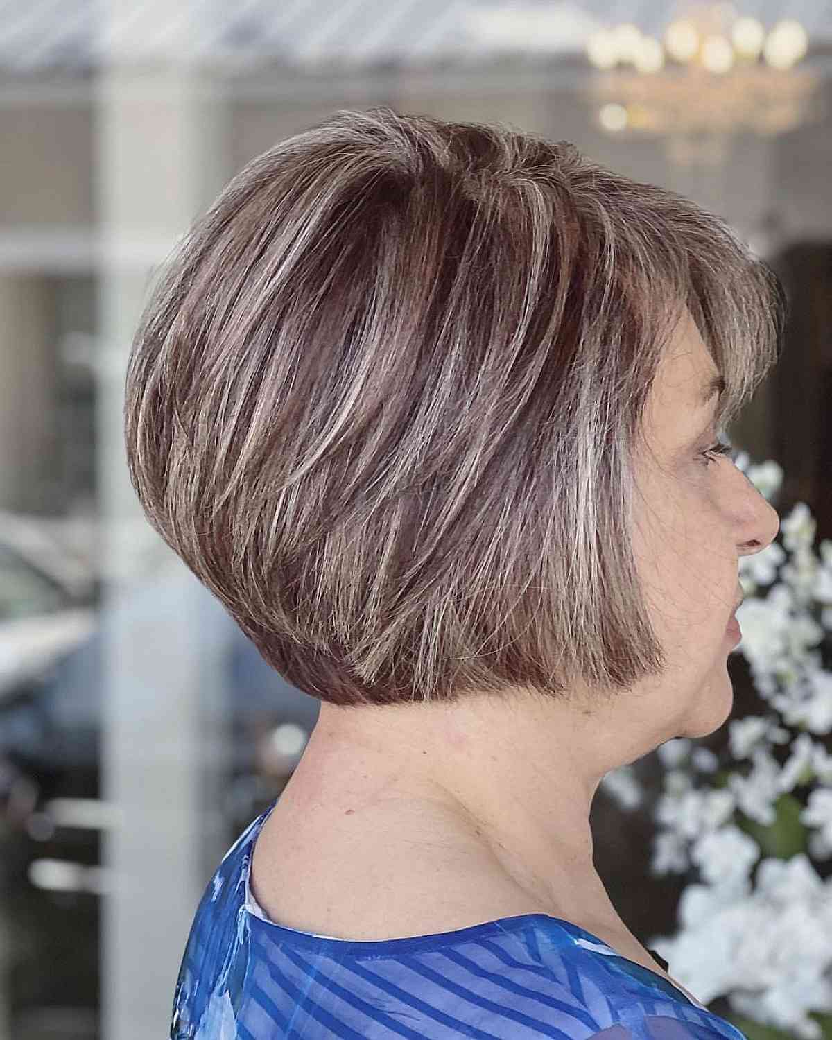Effortless Short Stacked Bob with Feathered Layers for 50-Year-Olds