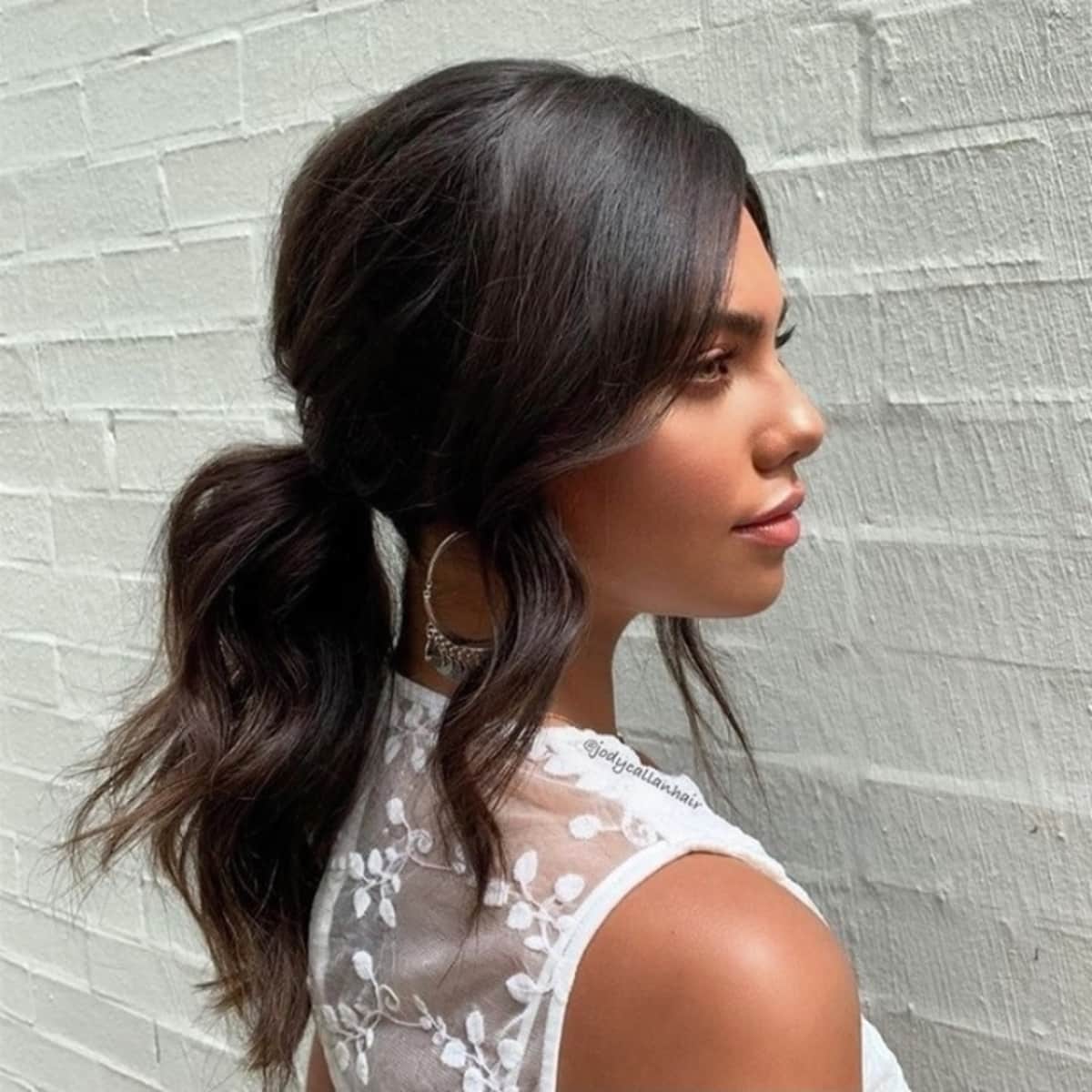 Effortlessly chic messy low ponytail