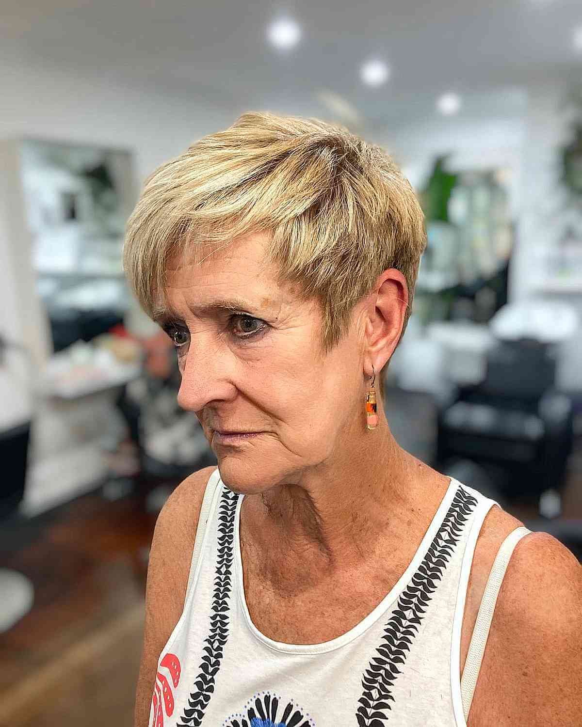 Stylish Side-Swept Choppy Hairstyle for Women 70 and Over