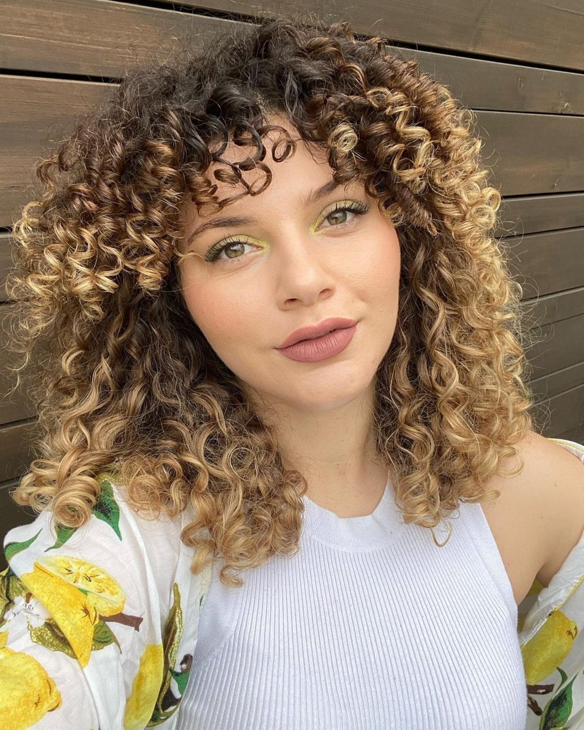 Effortlessly Styled Curly Layers with Ringlet Bangs 