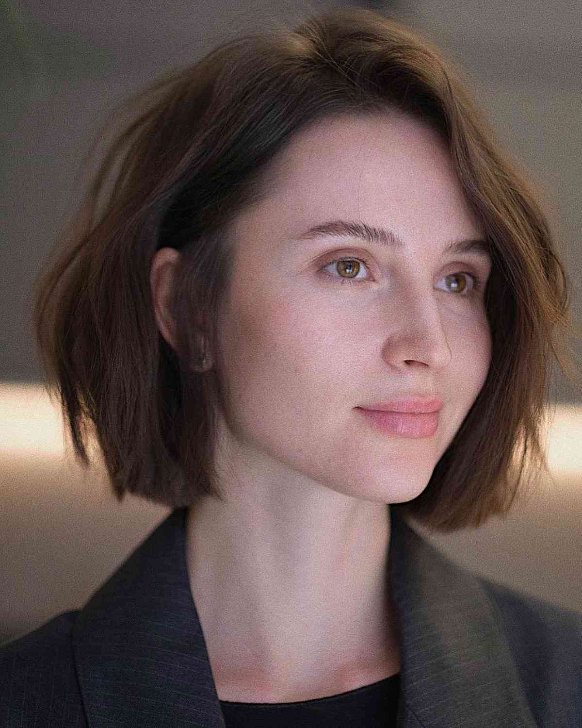 Effortlessly Tousled One-Length Bob Cut Above the Shoulders
