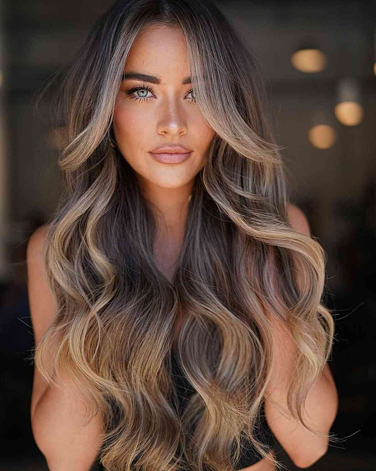 Elegant Blonde Balayage on Deep Brunette Tresses