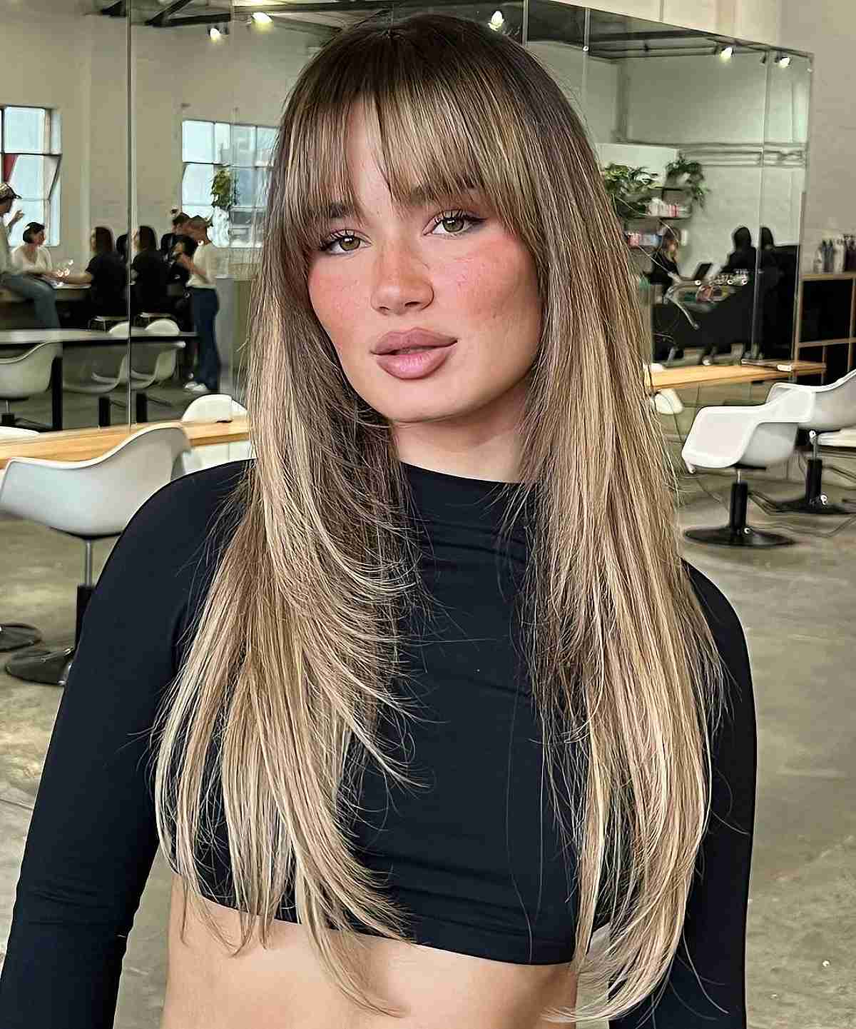 Elegant Bangs with Sleek Long Layers