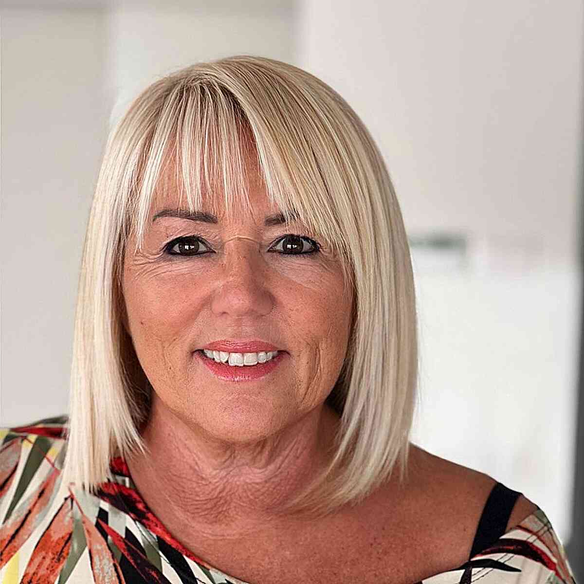 Elegant Barbie Blonde Bob for Fine Haired Ladies Aged 50