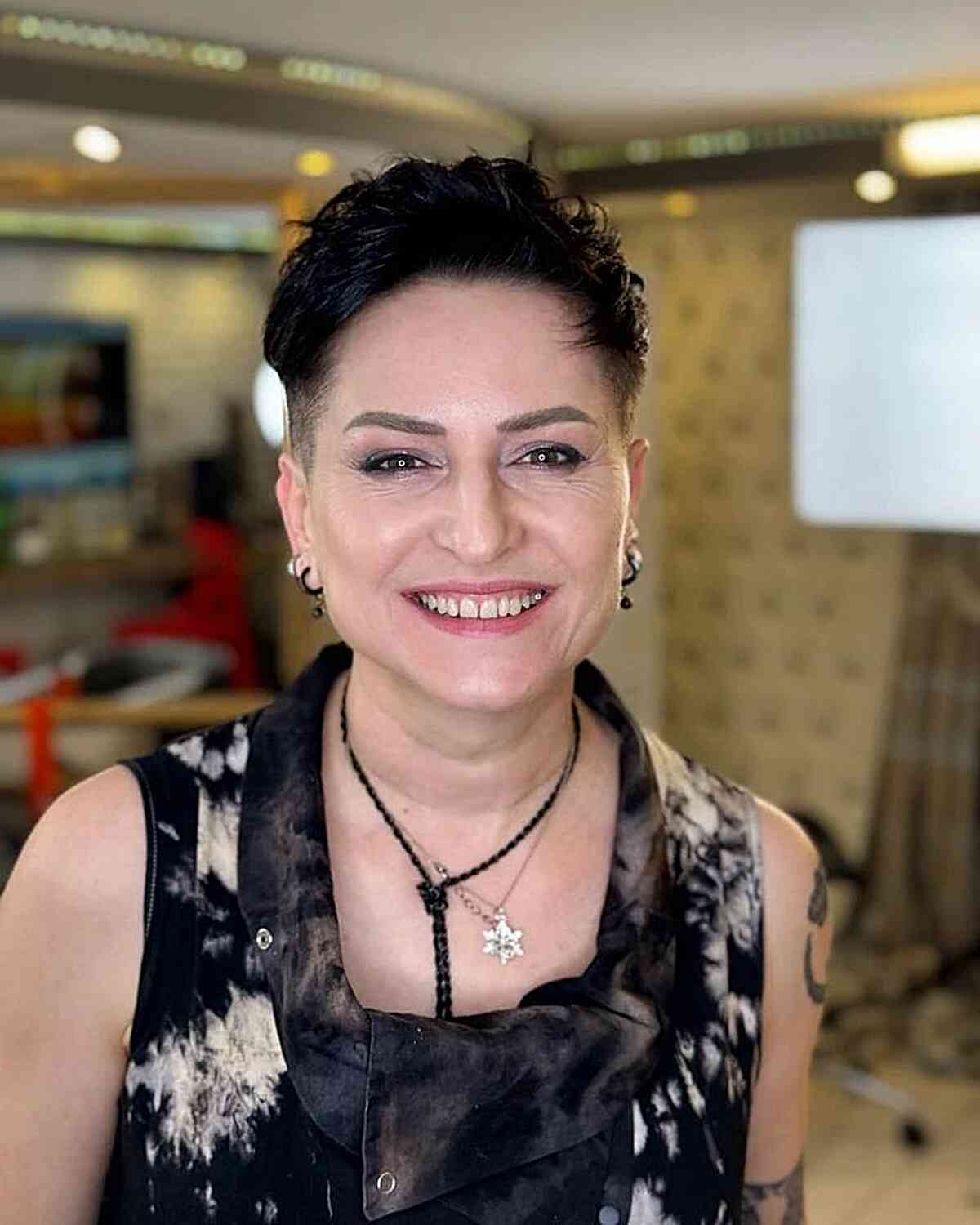 Elegant Black Pixie with Buzzed Sides for Ladies 40 and Over