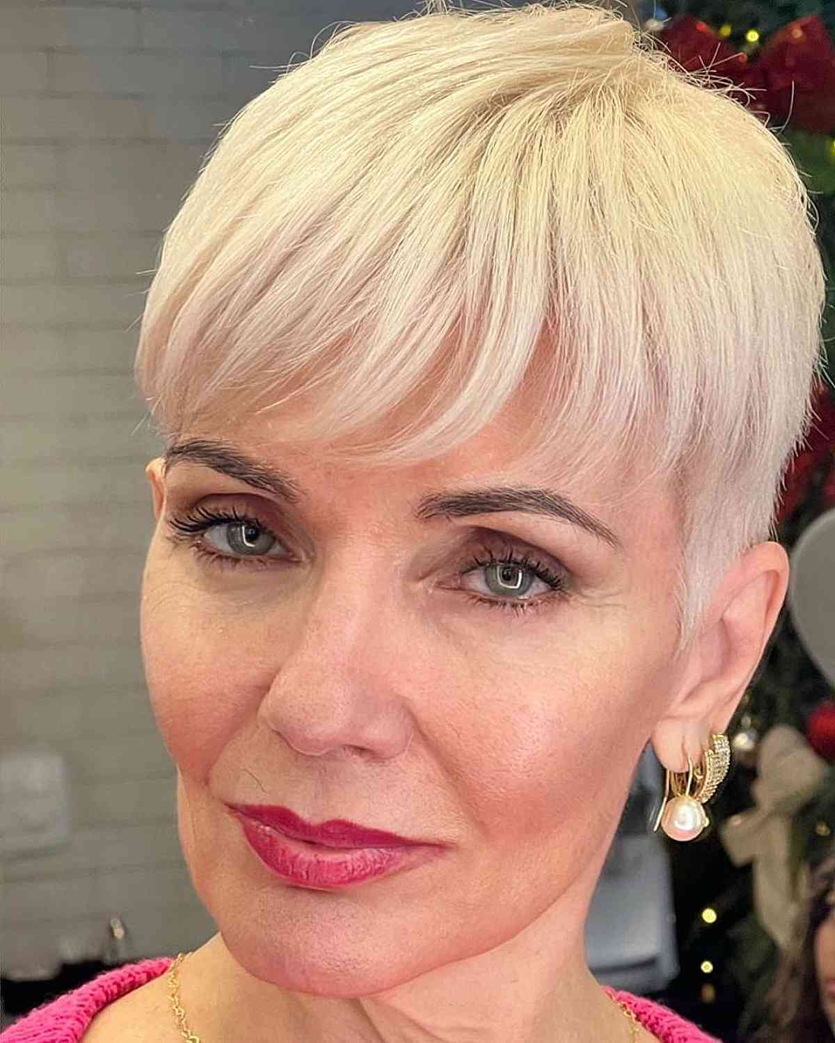 Elegant Blonde Wispy Pixie Style for Older Women