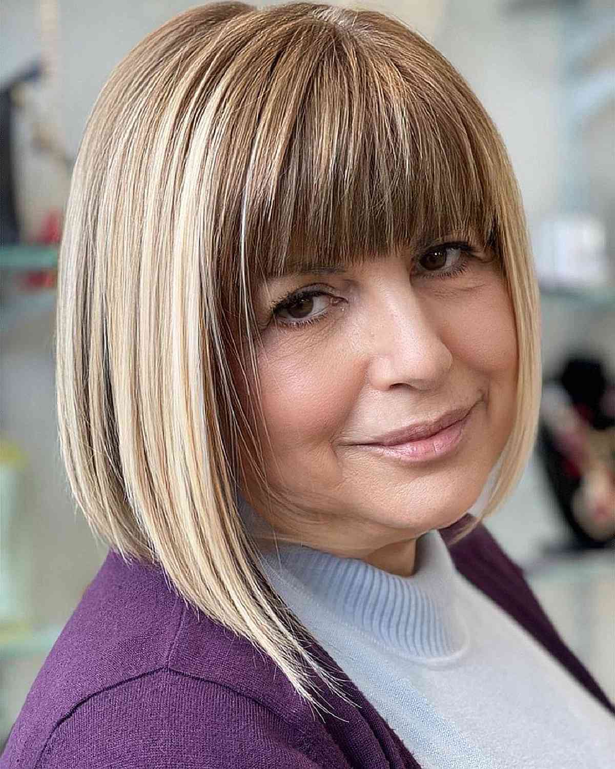 Elegant Bob with Full Bangs for Fine Hair