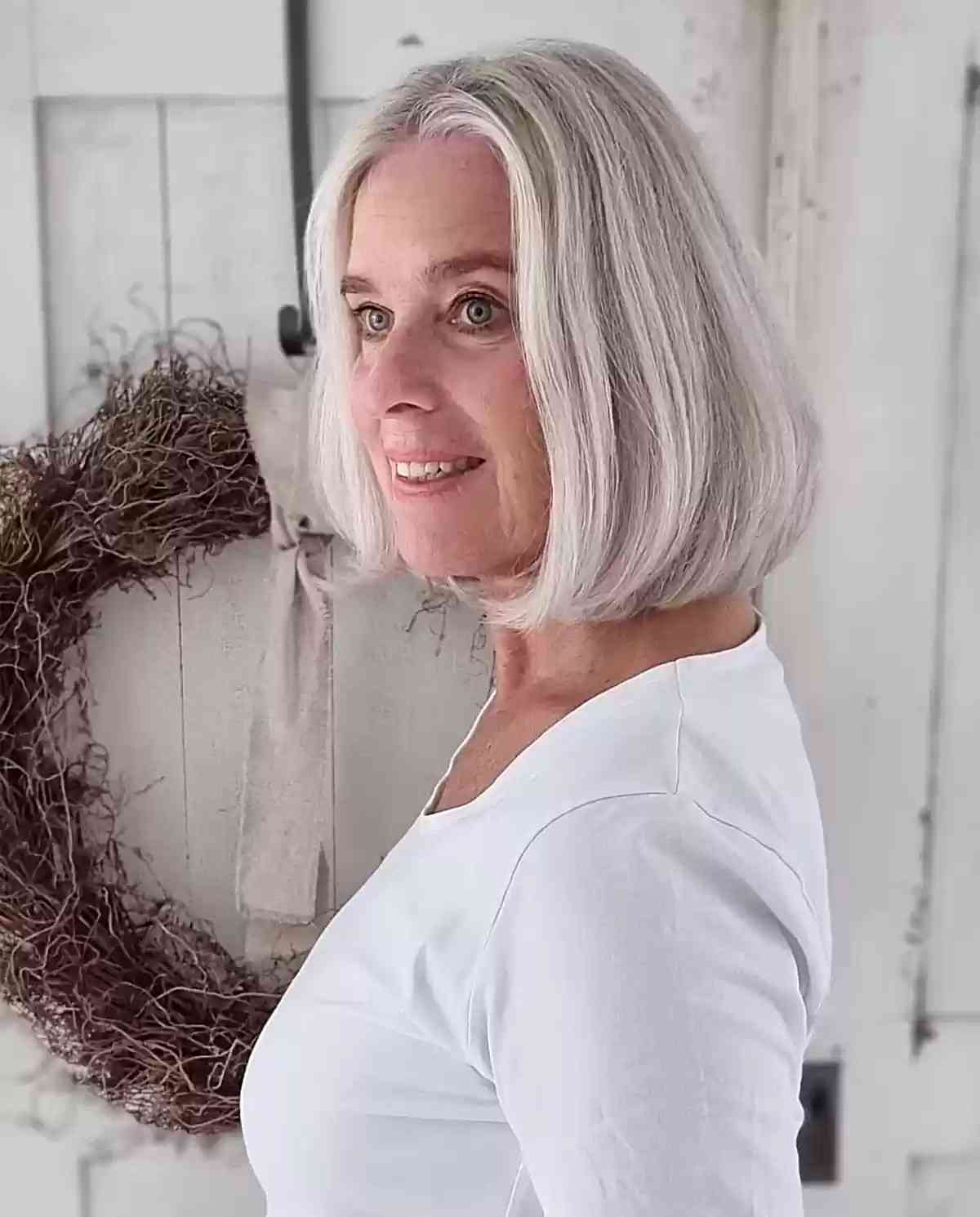 Above the Shoulder Middle-Parted Short White Bubble Bob Hairstyle for Mature Women