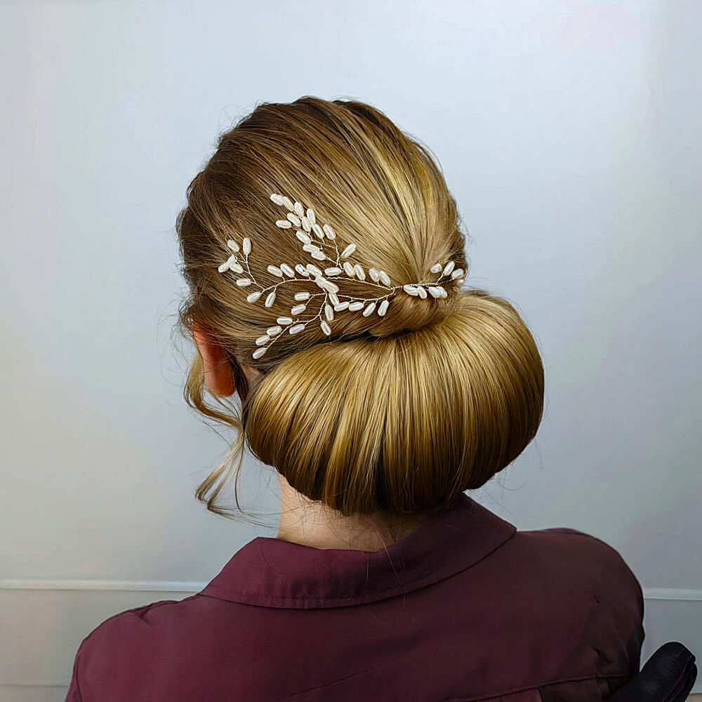 Elegant Chignon Adorned with a Pearl Hair Vine