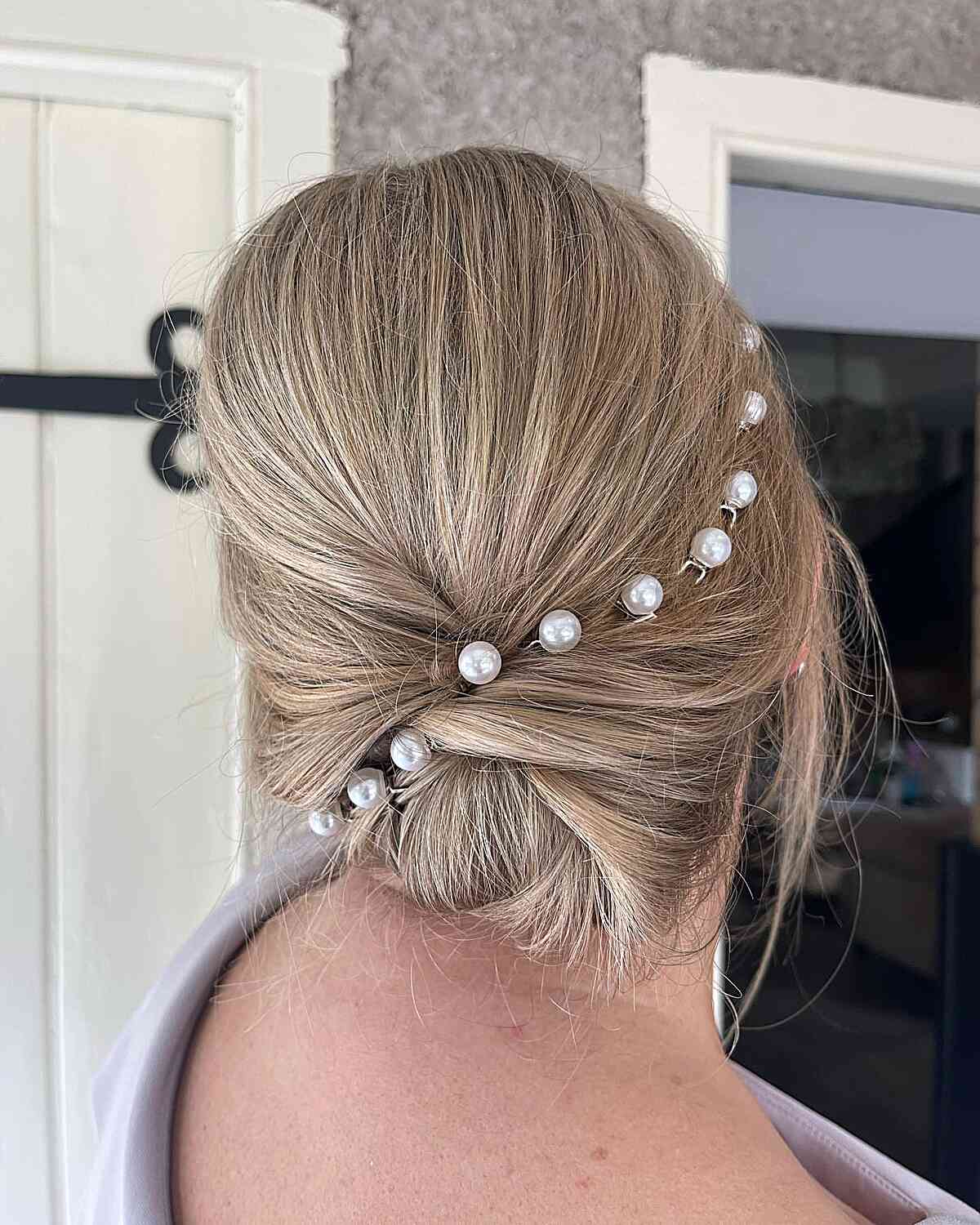 Elegant Chignon with Pearls for Mother of the Groom