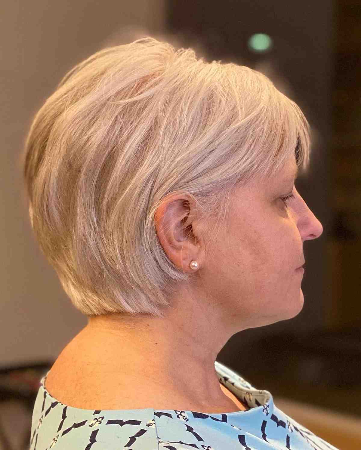 Elegant Concave Bixie Haircut with Delicate Layers for Women Over Fifty