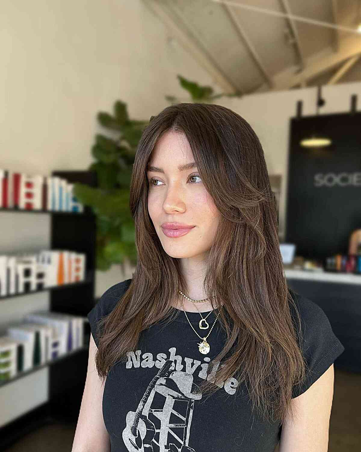 Elegant Curtain Fringe for Elongated Faces with Straight Hair and Layers on mid-length hair