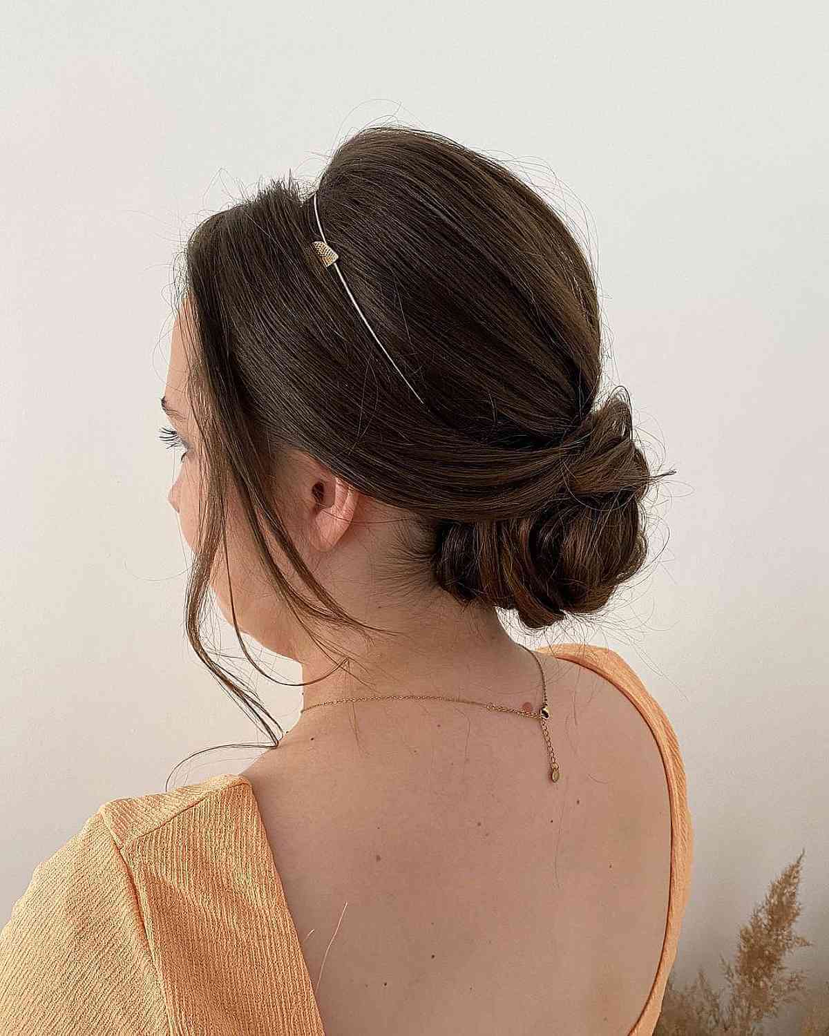 Elegant Dark Brunette Twisted Bun