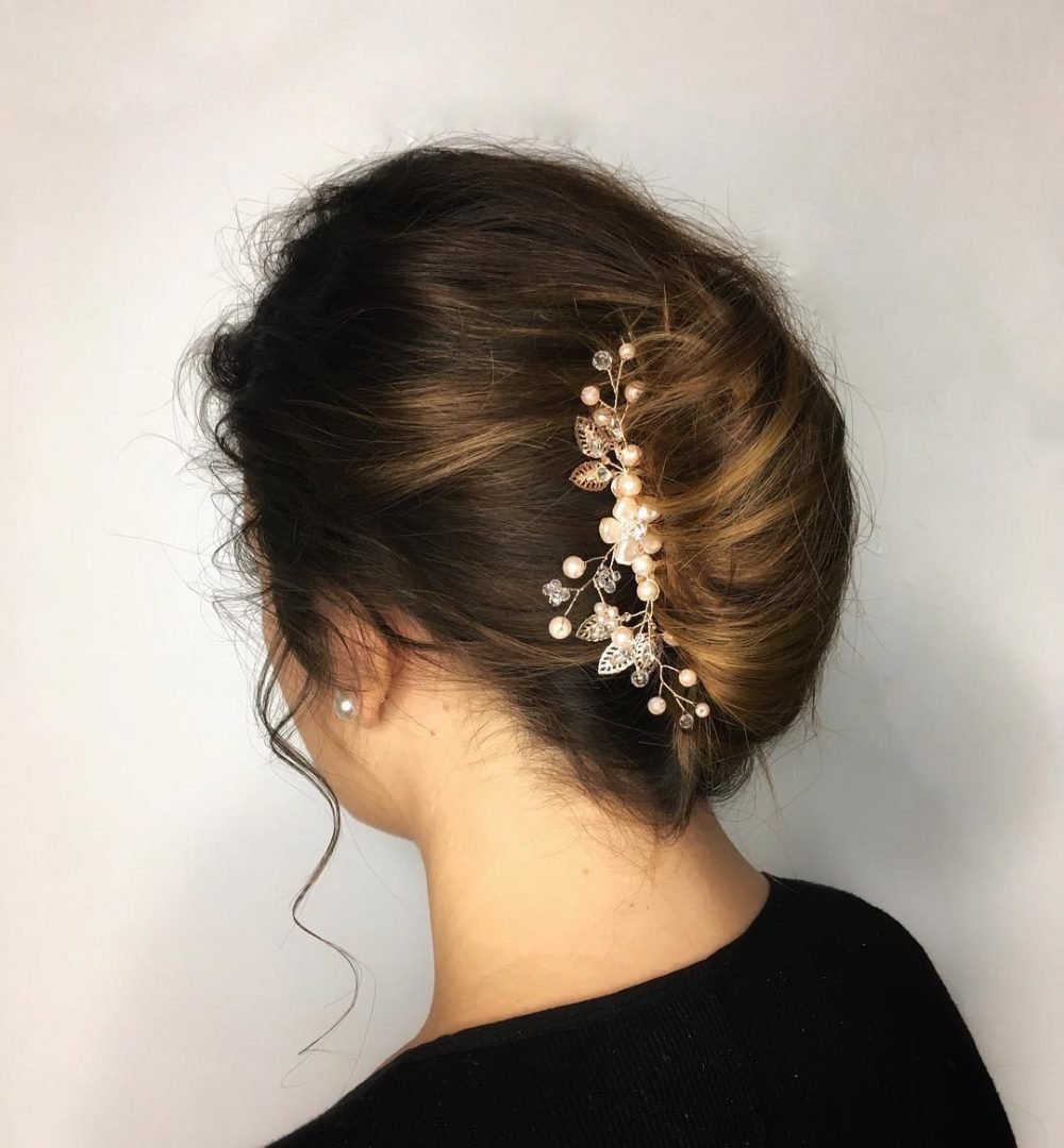 Stylish Chignon with Floral Accent