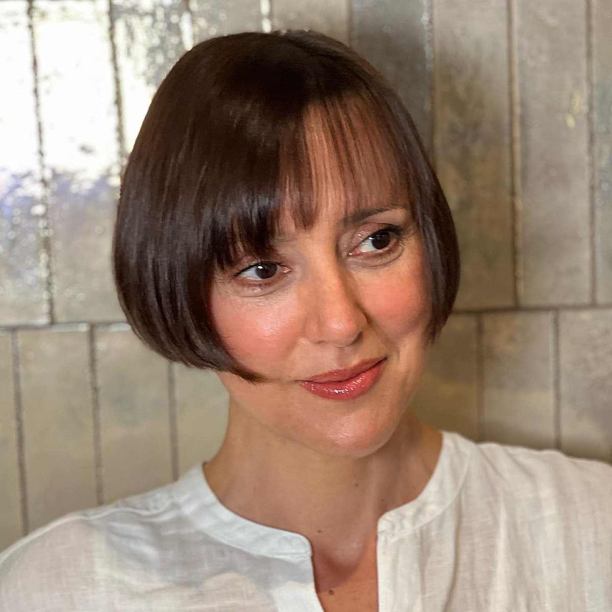 Elegant Ear-Length French Bob with Delicate Bangs