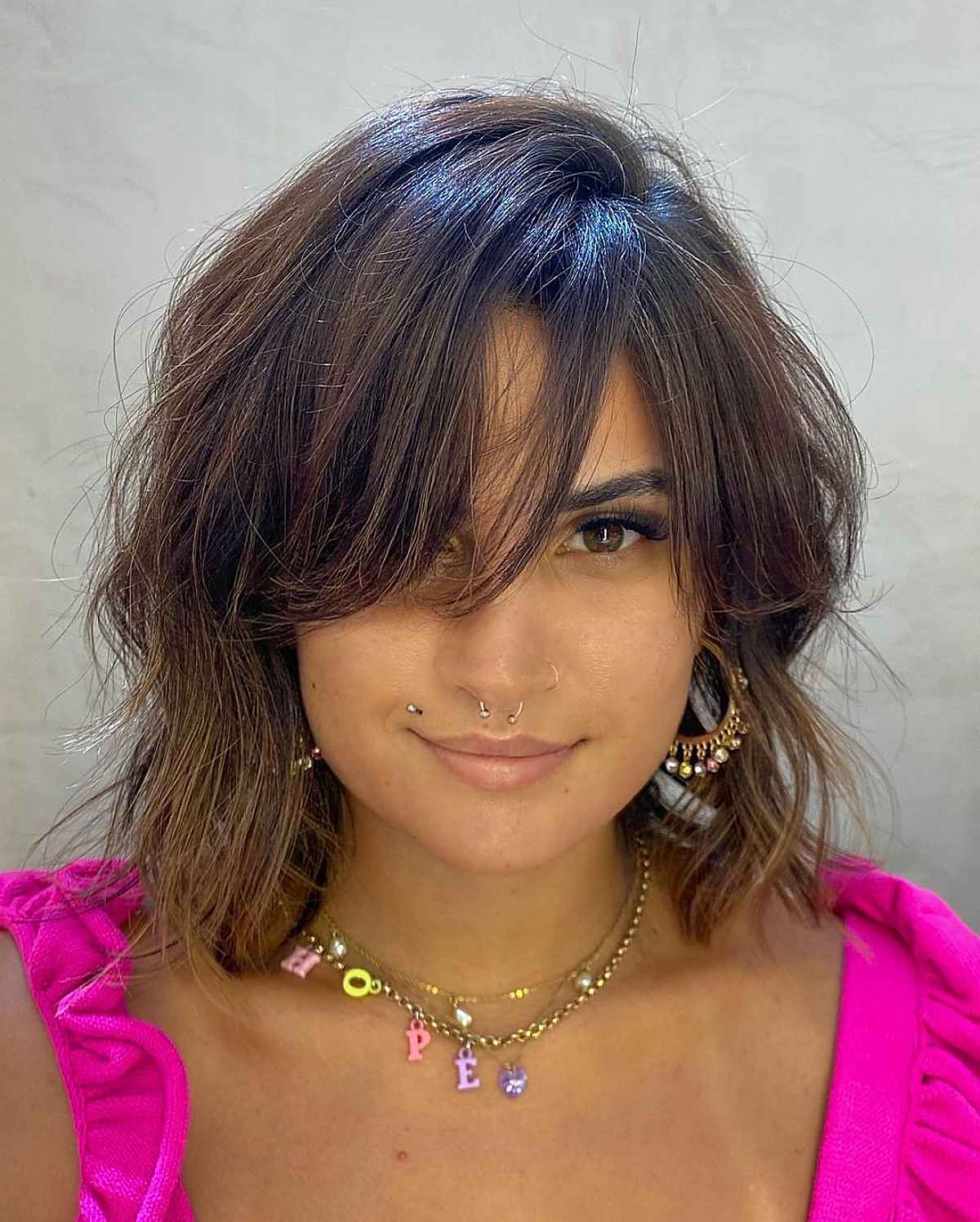 Elegant Layers and Side Part Bardot Bangs